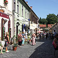 Cobbled medieval street with contemporary cafés and shops - Eger, Унгария