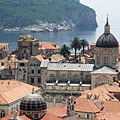 The cathedral of Dubrovnik is dedicated to Virgin Mary, and in the distance it is Lokrum Island - Дубровник, Хрватска